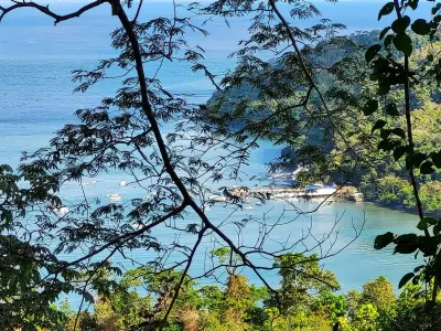 Lote con vista al mar en la cima de la montaña en una comunidad privada y cerrada con vista a Tambor 4