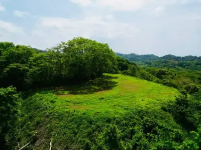 Ocean & Mountain View Property Near Santa Teresa with Impressive Building Platform Surrounded by Jungle