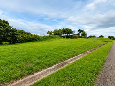 Lot in La Guácima, Alajuela, surrounded by nature and urban growth.