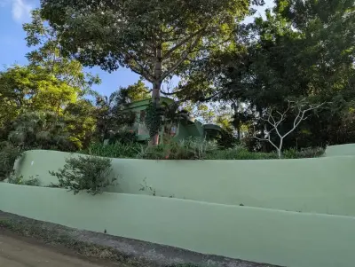 Jacó Montaña Retreat: Acogedor apartamento de 1 dormitorio con vistas al mar, piscina privada y exuberantes jardines en alquiler 4