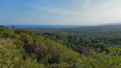 Hermoso lote con vista al mar en comunidad en Tambor 4