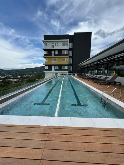 All FURNISHED Modern 1-Bedroom Apartment with Rooftop Pool and Panoramic Views in Santa Ana