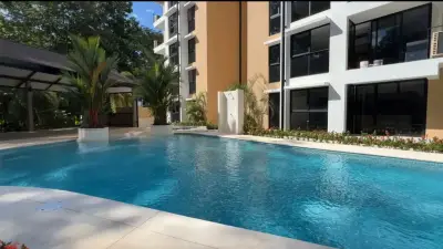 Impresionante condominio en Playa Jacó con vistas a la piscina: su refugio costero perfecto 1