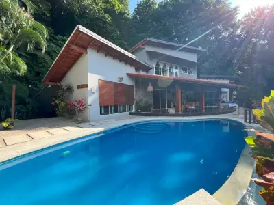 Luxury Santa Teresa Hills Estate: 3 Villas, 1 House, Yoga Deck, 3 Pools – Ocean & Jungle Views”