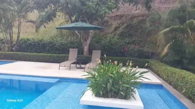Magnifique terrain de 131 m² dans la communauté fermée Hacienda Jacó, Jacó, Costa Rica 1