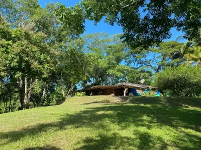 Propiedad con Vista al Mar de Casi 3 Hectáreas con Potencial Excepcional de Desarrollo y Hogar Boho en Montezuma / Delicias 4