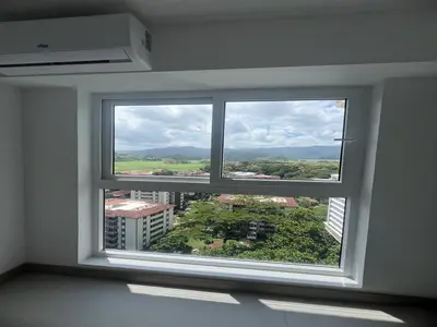 Élégant appartement de 3 chambres à Jacó avec balcon et vue sur la verdure 1